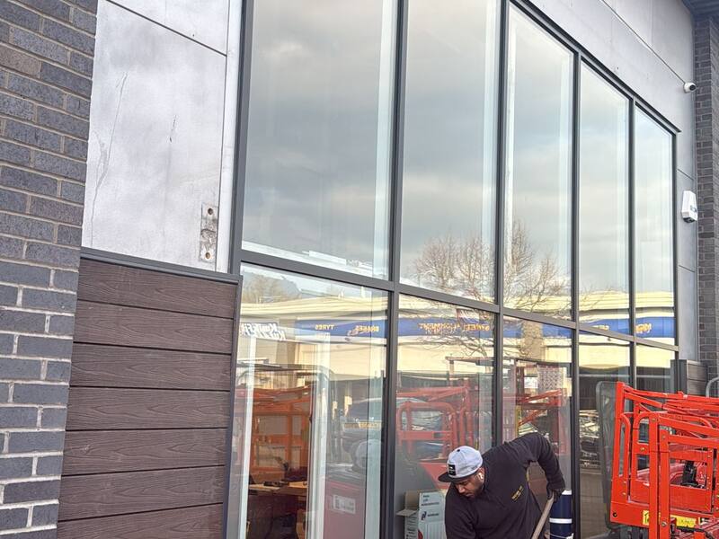 Curtain wall glazing team on site