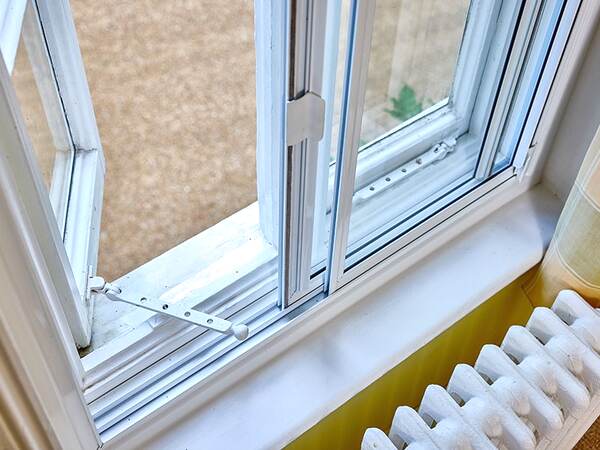 Secondary glazing sliding panel