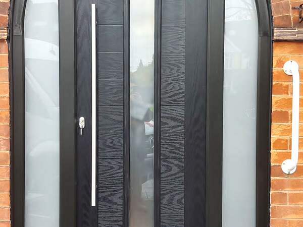 Arched composite entrance door